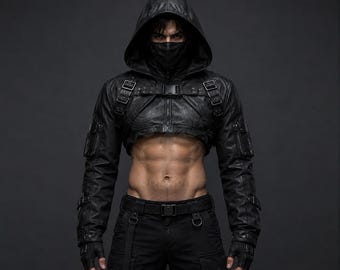 May include: A black cropped jacket featuring a hood, long sleeves, and multiple buckle straps across the chest and arms. The jacket is paired with black trousers and fingerless gloves, with a black face mask covering the lower portion of the face.