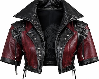 May include: A short-sleeved cropped jacket featuring a deep red textured finish with black leather-like trim. The garment includes a wide collar, silver-toned metal eyelets along the front lapels, and black lace-up detailing on the shoulders.