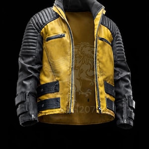 May include: A mustard yellow and black jacket featuring a high collar, ribbed shoulder panels, and black horizontal straps at the waist and cuffs. The jacket has a front zipper closure, two zippered chest pockets, and a faint lion graphic on the interior.