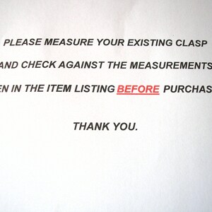 May include: A white piece of paper with black text that reads: "PLEASE MEASURE YOUR EXISTING CLASP AND CHECK AGAINST THE MEASUREMENTS GIVEN IN THE ITEM LISTING BEFORE PURCHASING. THANK YOU."