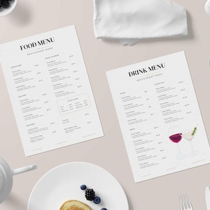 May include: Two white menus with black text. The top menu is titled "Food Menu" and lists starters, salads, desserts, and main courses. The bottom menu is titled "Drink Menu" and lists wine, cocktails, and beer.