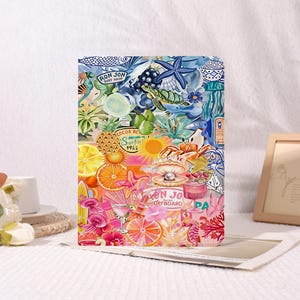 May include: A rectangular tablet case featuring a vibrant collage of tropical and coastal imagery, including sea turtles, pineapples, citrus slices, cocktails, and surf-themed text like Ron Jon Surf Shop, rendered in a bright, multi-colored palette.