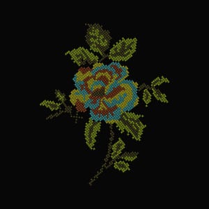 May include: A cross-stitch floral design featuring a rose with blue, yellow, and maroon petals, surrounded by green leaves and stems, set against a black background. The needlework style gives a textured appearance to the flower.