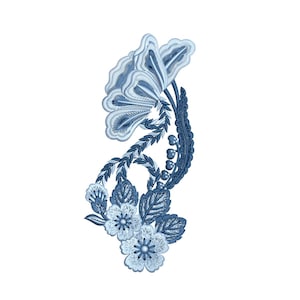 May include: A detailed blue floral embroidery design featuring a cluster of flowers, leaves, and stems. The design showcases varying shades of blue, creating depth and texture. The embroidery is likely for fabric embellishment or decorative purposes.