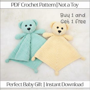 May include: Two crochet baby security blankets, one in light blue and one in yellow, each featuring a teddy bear head and a square body. The text "PDF Crochet Pattern | Not a Toy" and "Buy 1 and Get 1 Free" are visible. The text "Perfect Baby Gift | Instant Download" is also visible.