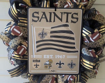 Guirlanda de futebol preta e dourada: decoração para porta do dia do jogo do New Orleans Saints