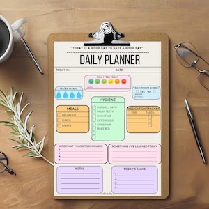 A daily planner checklist on a clipboard. The checklist includes sections for water intake, meals, hygiene, medication tracker, important things to remember, notes, today's tasks, and how the user is feeling. The checklist has a light pink, light blue, light yellow, and light green color scheme. The text on the checklist reads 'How I Feel Today' 'Water Intake' 'Meals' 'Breakfast' 'Lunch' 'Dinner' 'Hygiene' 'Shower/Bath' 'Brush Teeth' 'Wash Face' 'Get Dressed' 'Comb Hair'