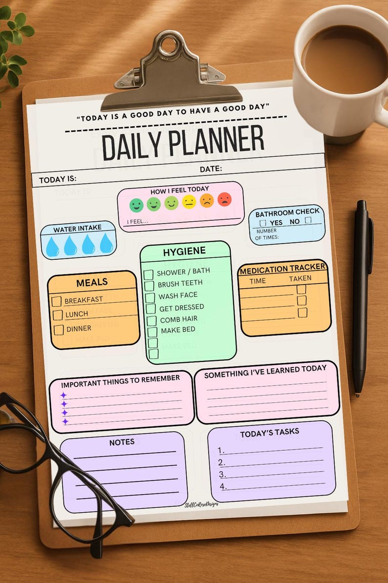 A daily planner with a light blue, pink, and green color scheme. The planner includes sections for water intake, meals, hygiene, bathroom check, medication tracker, important things to remember, something I've learned today, notes, and today's tasks. The planner has a title that reads 'Today is a good day to have a good day' and 'Daily Planner'.