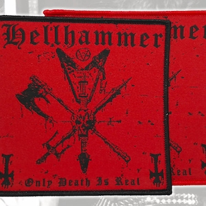 May include: A square red fabric patch with a black embroidered border. The patch features the black text Hellhammer at the top and Only Death Is Real at the bottom. The center graphic depicts a black skull, an axe, and a trident in a cross design.