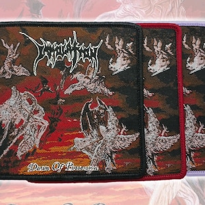 May include: Three rectangular woven patches featuring a dark, fiery red and black background with winged figures. The text Immolation is at the top and Dawn Of Possession is at the bottom. Each patch has a distinct border in black, red, or light purple.
