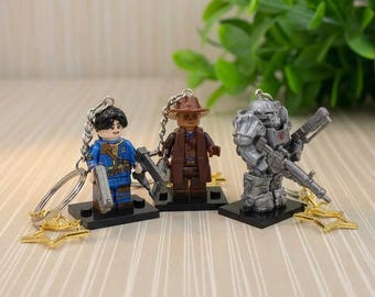 Lucy , Cooper and Max Minifigure Keychain |  TV Episode Fallout Inspired Toy keyring