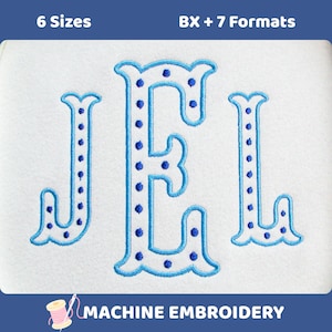 Puede incluir: Diseño de bordado a máquina con las letras JEL en una fuente serif azul claro con relleno blanco y puntos azul oscuro. El texto 6 Sizes y BX + 7 Formats aparece en la parte superior, con MACHINE EMBROIDERY en la parte inferior.