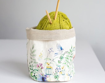 Storage basket with meadow print.