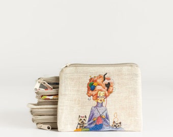 Small zip purse with Lady who is knitting print