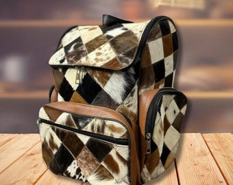 Mochila cambiador de piel de vaca, bolso de cuero hecho a mano estilo western