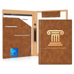 May include: Brown leather business portfolio with a gold pillar logo and the text "ADD YOUR LOGO/TEXT/PHOTO". The portfolio is open, revealing a pen, notepad, and a quotation document.