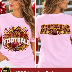 May include: A light pink t-shirt featuring a Washington Commanders football graphic. The front displays a circular logo with the text COMMANDERS FOOTBALL and a helmet. The back shows the text COMMANDERS with a football graphic in the center.