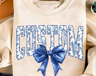 Lazo de coqueta universitario azul floral personalizado (PNG), nombre de mascota de equipo deportivo personalizado, lazo azul chinoiserie personalizado Toile Mama (PNG), porrista personalizado (PNG)