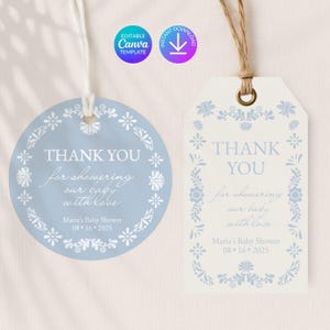 May include: Two baby shower thank you tags. One is round and light blue, the other is a cream color. Both have floral borders and the text "THANK YOU for showering our baby with love." The date "08-16-2025" is also included.