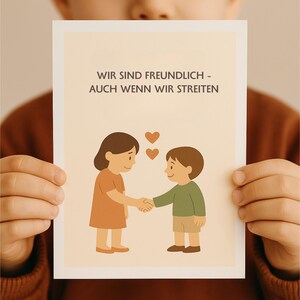 May include: A greeting card with the text "WIR SIND FREUNDLICH - AUCH WENN WIR STREITEN" and an illustration of two children shaking hands. The children are wearing orange and green clothing. Three hearts float above them.