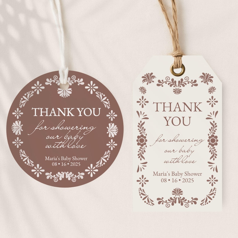 May include: Two baby shower thank you tags. One is round and brown, the other is a cream color. Both have floral borders and the text "THANK YOU for showering our baby with love." The date "08.16.2025" is also included.