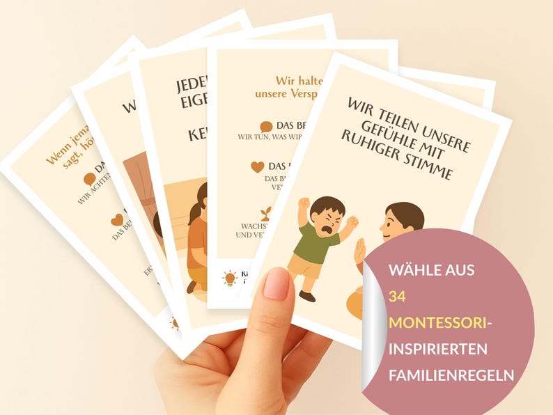 May include: A hand holds a fan of cards with illustrations and text in German. The cards feature images of people and phrases like "Wir teilen unsere Gef&uuml;hle mit ruhiger Stimme." A sticker reads "W&Auml;HLE AUS 34 MONTESSORI-INSPIRIERTEN FAMILIENREGELN."
