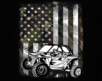 May include: A black and white graphic of an off-road vehicle with a driver, set against a camouflage American flag background. The flag features white stripes and a star-filled field. The image includes the text "PNG / 300 DPI / DIGITAL DOWNLOAD".