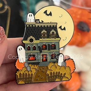 Haunted House sliding enamel pin!