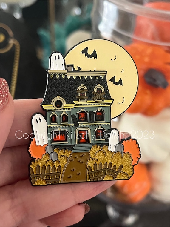 Haunted House sliding enamel pin!