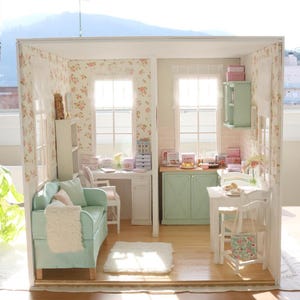 May include: A rustic wooden sign with the text "Welcome to our home" in white lettering. The sign has a distressed finish and a simple, inviting design, suitable for a front porch or entryway.