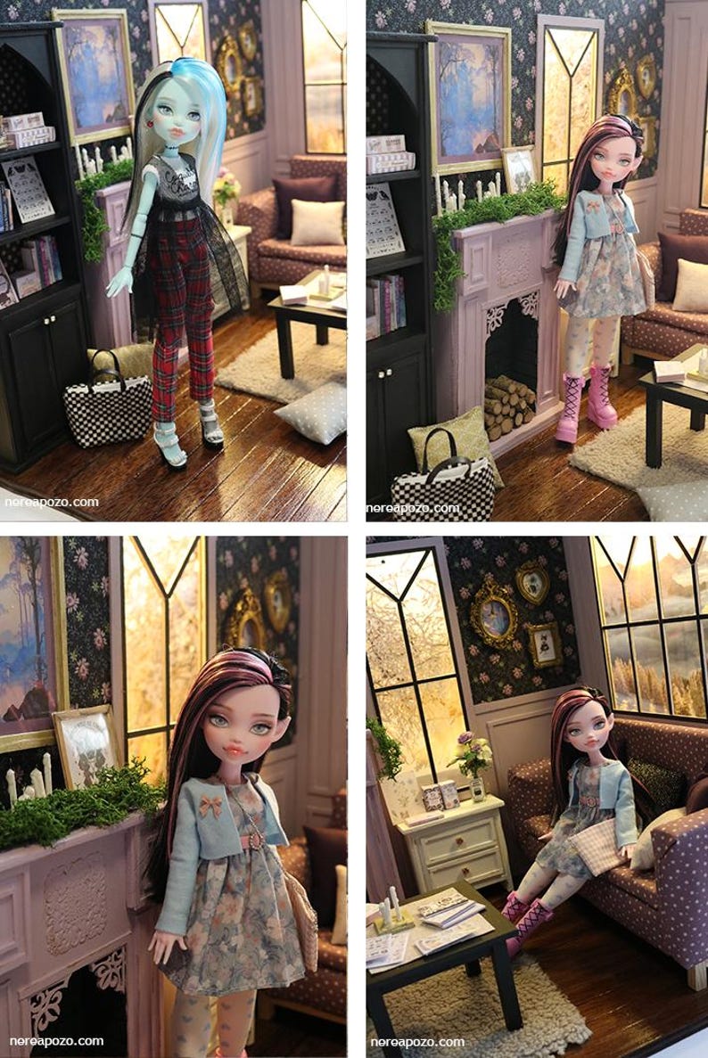 May include: A doll with long dark hair featuring pink highlights, wearing a light blue cardigan over a floral dress, white patterned tights, and pink platform boots. The doll is posed in a miniature room setting with a fireplace and furniture.