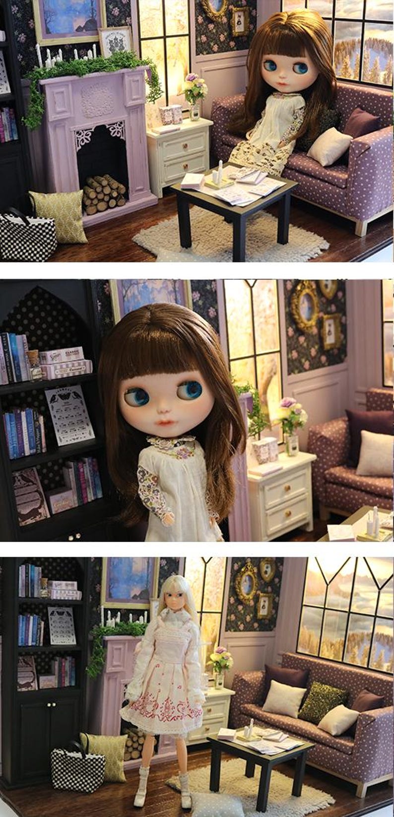 May include: A miniature dollhouse living room scene featuring a doll with long brown hair, a cream-colored dress, and blue eyes. The room includes a purple fireplace, a purple polka-dot sofa, a black coffee table, and a black bookshelf filled with books.