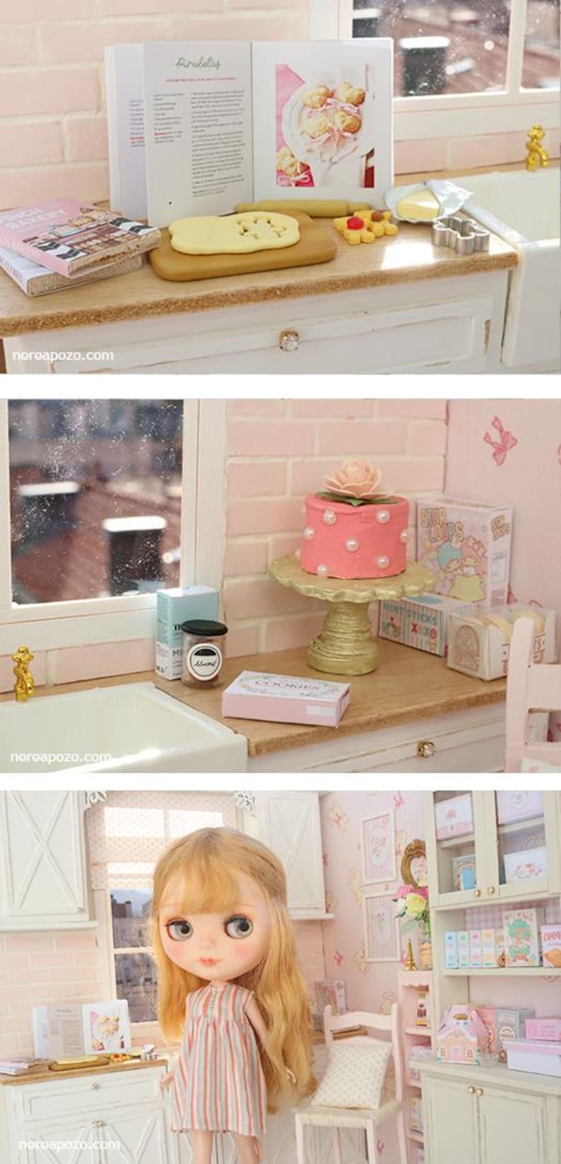 May include: Miniature kitchen scene with a doll, cookbooks, and baking supplies. Includes a pink cake, cookie boxes, and a rolling pin. The scene is set in a dollhouse with a window and white cabinets.