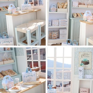 May include: A miniature bakery scene featuring light blue wooden shelves, a counter with a wooden top, and two stools with woven seats. The shelves are stocked with small boxes, bags, and baked goods. A sign reads Chocolat de Paris.