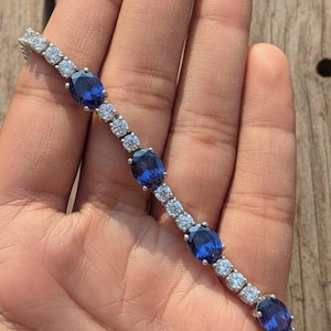 Bracciale tennis ovale in tanzanite blu: argento 925 e zirconi cubici, placcato rodio