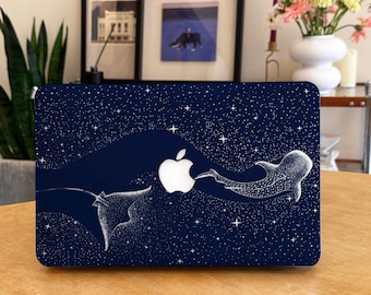 May include: A navy blue laptop case featuring a white Apple logo and a starry night design. The design includes a manta ray and a whale shark, with white stars scattered across the dark blue surface.