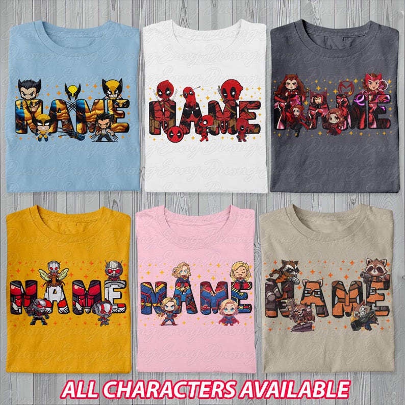May include: Six folded t-shirts in various colors, each featuring a superhero-themed design with the word "NAME" in large, colorful letters. The shirts are light blue, white, gray, yellow, pink, and tan. The text "ALL CHARACTERS AVAILABLE" is at the bottom.