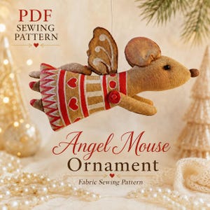 May include: A fabric mouse ornament with angel wings, wearing a tan and red dress decorated with hearts and zig-zag patterns. The text reads PDF SEWING PATTERN and Angel Mouse Ornament Fabric Sewing Pattern. The mouse has a brown nose and ears.