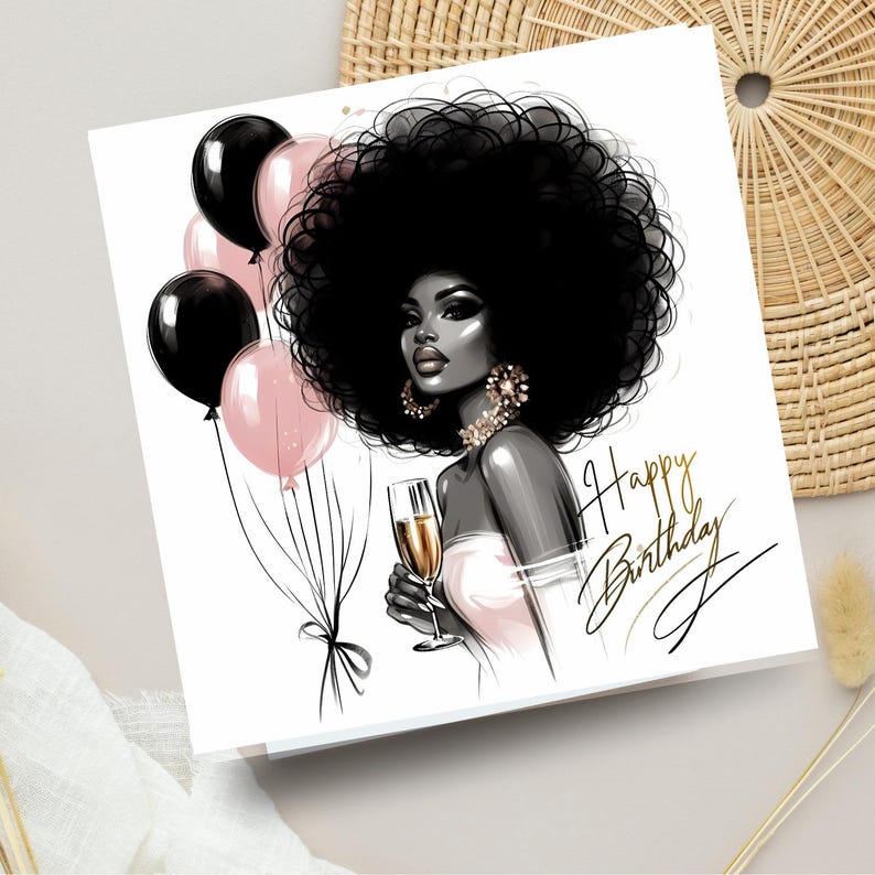 May include: A greeting card with a black and white illustration of a woman with a large afro, holding a champagne glass. Pink and black balloons are on the left. The words "Happy Birthday" are written in gold script.