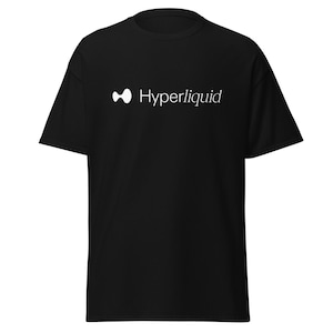 May include: Black t-shirt with a white logo and the word "Hyperliquid". The logo is a stylized, abstract shape. The t-shirt has a classic crew neck and short sleeves.