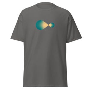 May include: A dark gray t-shirt featuring a teal and yellow abstract design. The graphic is a stylized infinity symbol, with a gradient effect. The shirt has short sleeves and a crew neck.