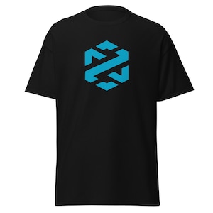May include: Black t-shirt featuring a geometric design in light blue. The design is a stylized hexagon with an abstract pattern inside. The shirt is made of a soft material and has a classic crew neck.