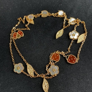 Van Cleef & Arpels Gold Floral Leaf Multi-Motif Chain Necklace