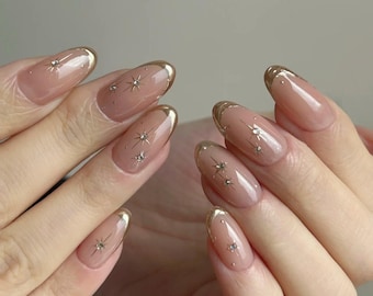 Gold French Star Press On Nails: Hand-Painted Faux Acrylics