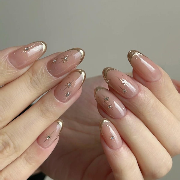Gold French Star Press On Nails: Hand-Painted Faux Acrylics