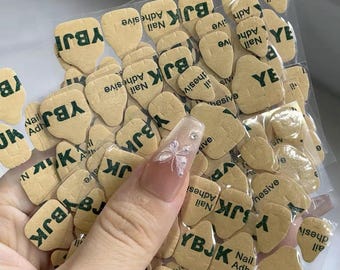 Super stark klebende Nageltabs zum Drücken auf die Nägel