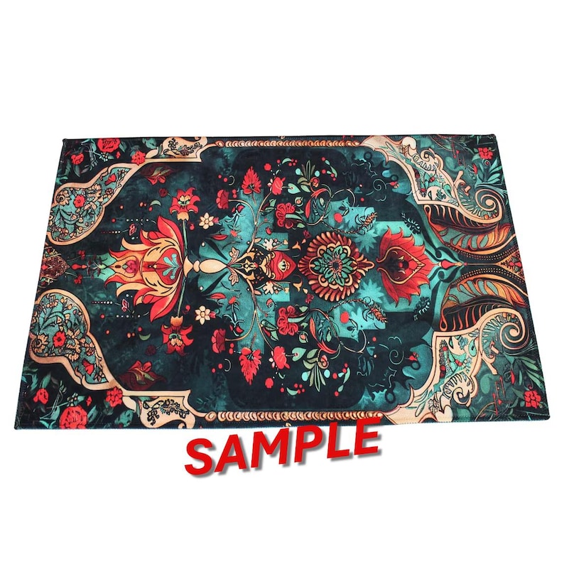 May include: A rectangular prayer mat featuring a dark teal background with a symmetrical floral pattern in shades of red, orange, and cream. The design includes intricate botanical motifs and scrolling elements. The word SAMPLE is printed in red.