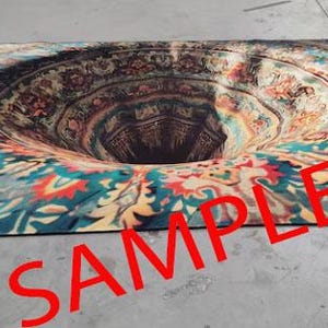 May include: A colorful rug with a large, circular hole in the center, creating an optical illusion of a swirling vortex. The rug has a black border and intricate patterns in shades of blue, green, red, and yellow.