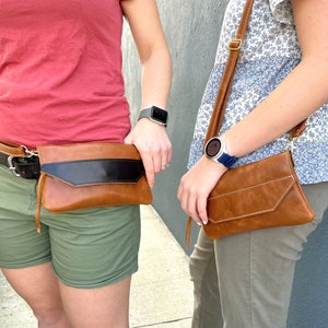 The Path Less Traveled crossbody or hip purse. Choose from two colors. Adjustable strap.