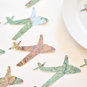 Small and Large Vintage Map Paper Airplane Confetti Available. White cloud cutouts also available. Perfect for table decorations.